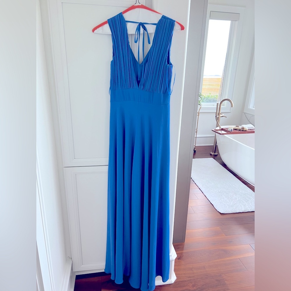 Bought in Italy to wear in the States. It didn’t fit. Pristine condition.